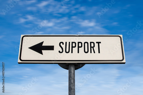 Support road sign, arrow on blue sky background. One way blank road sign with copy space. Arrow on a pole pointing in one direction.