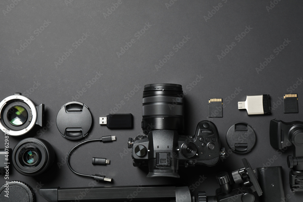 Flat lay composition with camera and video production equipment on black  background. Space for text Stock Photo | Adobe Stock