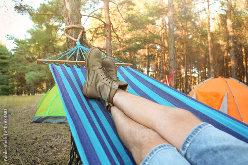 Man resting in comfortable hammock outdoors  closeup