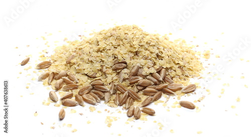 Wheat germ and spelt seed pile isolated on white background