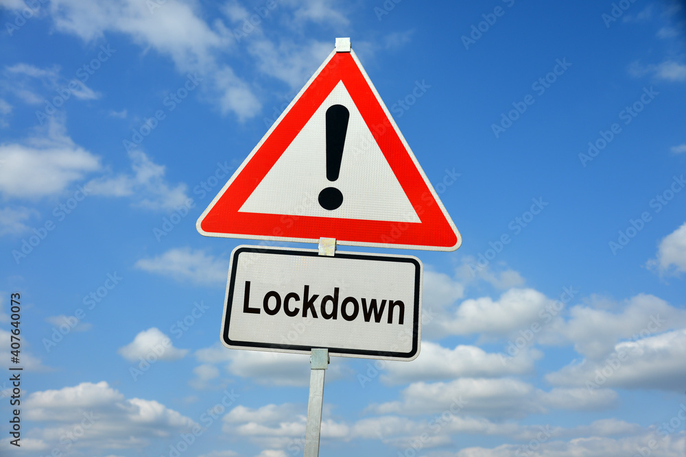 Verkehrsschild mit symbolischer Warnung vor Lockdown