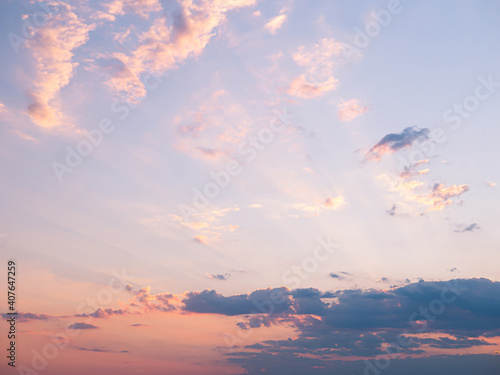 Pink, blue and purple clouds sunset sky. Abstract nature background. Sunset Glow Evening Scene. Pastel soft colorful smooth blurred sky. Romantic sunrise.