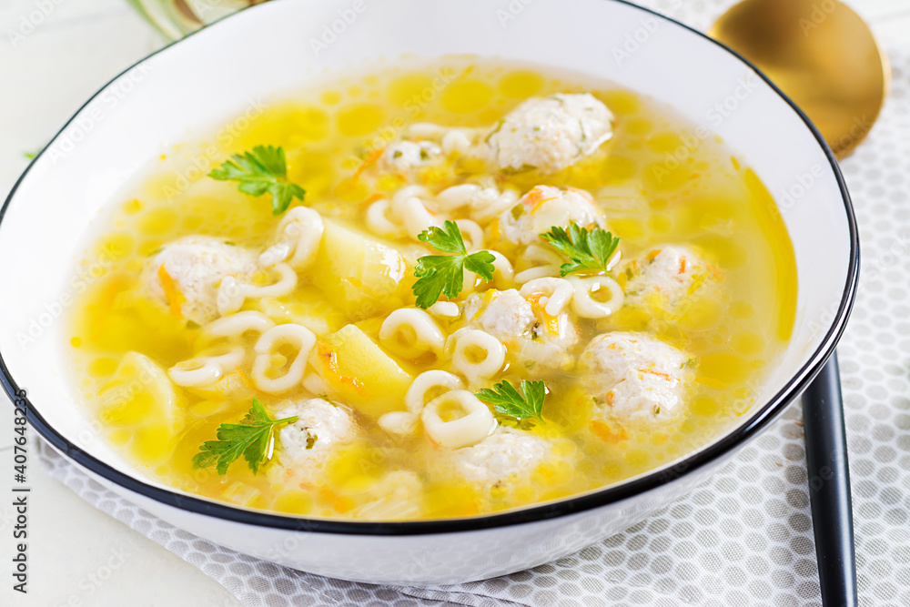 Healthy chicken meatballs soup and pasta. Simple recipe for cooking at home.
