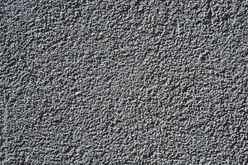 Greyscale shot of the textures on a rough background photo