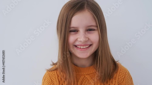 Portrait of Smiling little girl, looking at camera