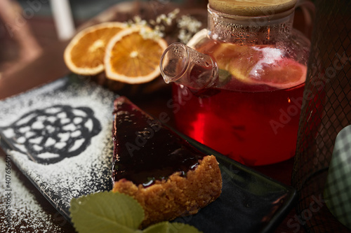 pot of tea wit cake and coffee