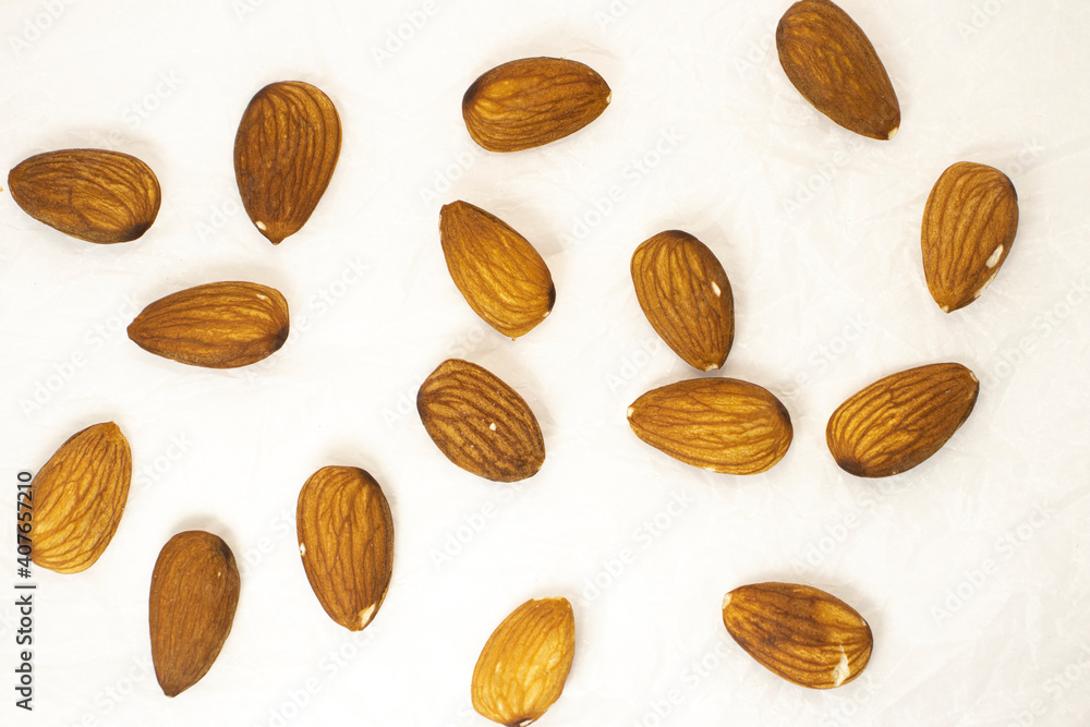 almonds on white isolated background almonds on white isolated background