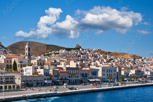 Ermoupoli town, Syros island, Greece, orthodox church of Resurrection of Christ, colorful houses, summer sun, vacation, getaway. Mediterranean sea.