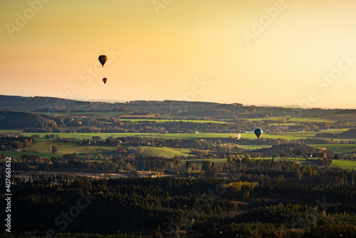 sunset landscape with balloons