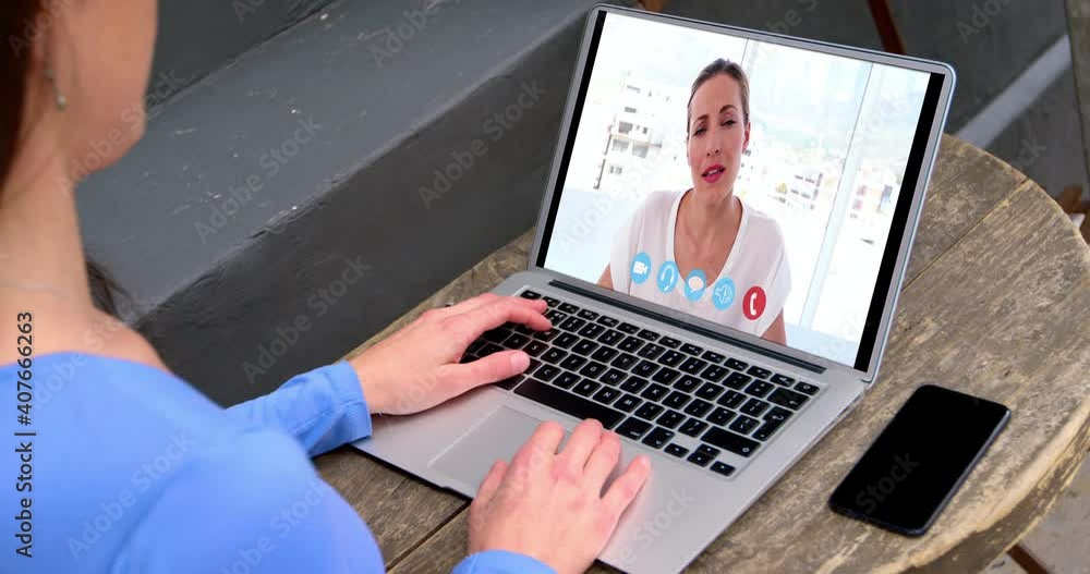 Caucasian woman using laptop on video call with female colleague working from home Caucasian woman using laptop on video call with female colleague working from home