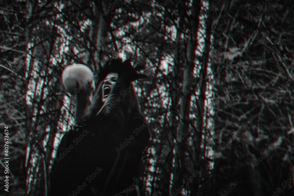 blurry mystical reflection of a black witch with a skull in her hands performing a satanic ritual blurry mystical reflection of a black witch with a skull in her hands performing a satanic ritual