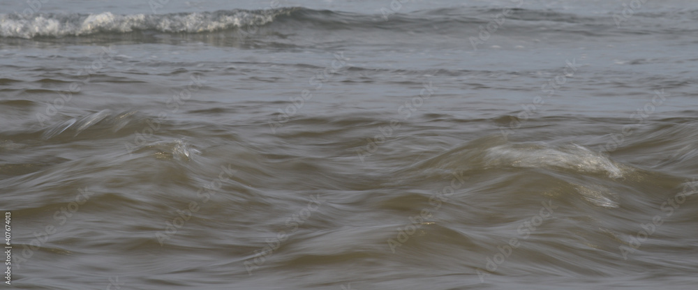 Turbulent water emerging at Pentewan Harbour near St Austell Cornwall