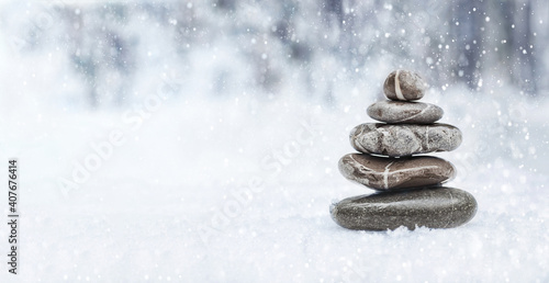 The object of the stones in the winter forest. Zen concept. Winter snowy Meditation.