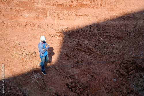Photography Top view of civil engineer Inspecting the construction site Building development