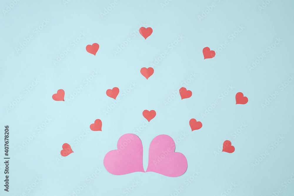 Heart shaped paper sticked on blue background. Emblem of love for happy women, beloved mother, birthday cards and valentine greeting designs. Valentine's day backgrounds. Templates to convey our love. Heart shaped paper sticked on blue background. Emblem of love for happy women, beloved mother, birthday cards and valentine greeting designs. Valentine's day backgrounds. Templates to convey our love.