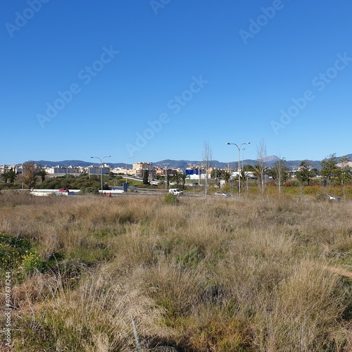 outdoor photo field and city