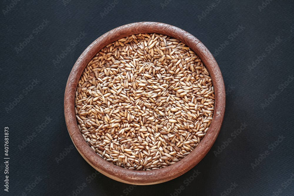 A cereals in wooden bowls top view A cereals in wooden bowls top view
