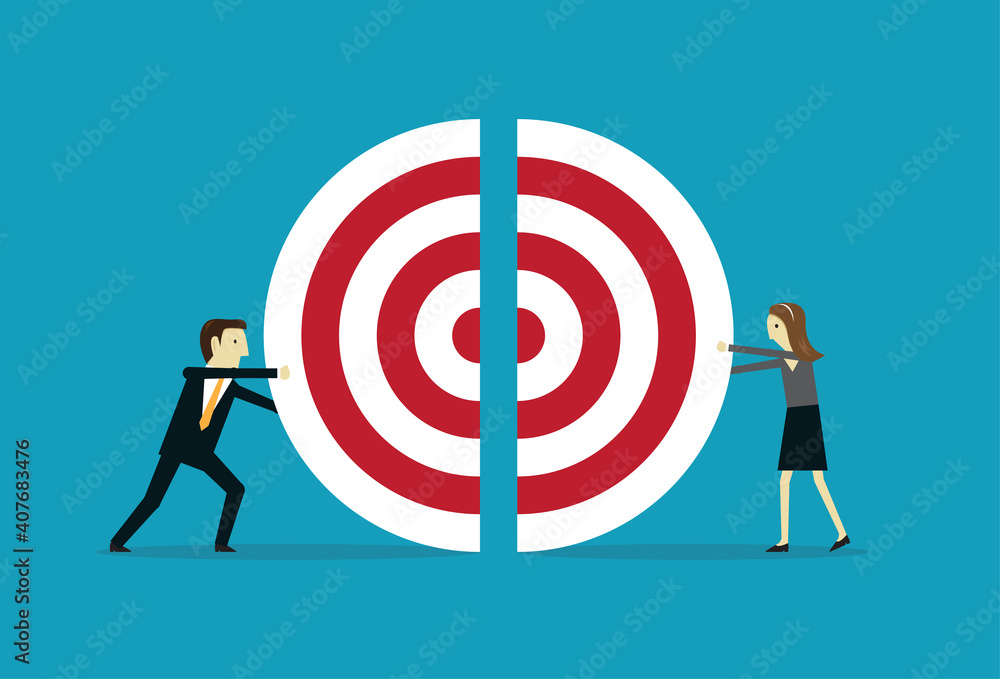 Business people push jigsaw target together Business people push jigsaw target together