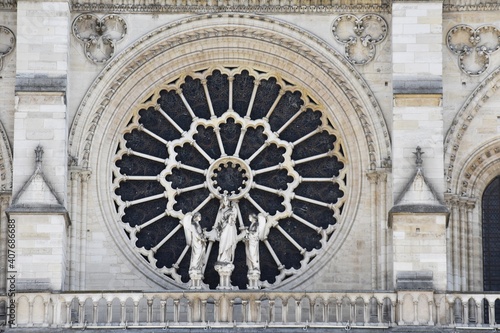 Details facade of the famous Notre-Dame cathedral, in Paris, France.