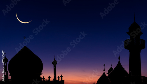 Photography Mosques dome on dark blue twilight sky and crescent moon on background, symbol i