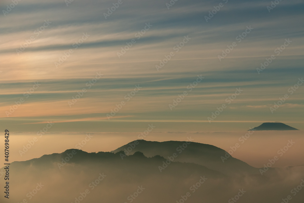 view of the sindoro mountains with a sea of ​​clouds
