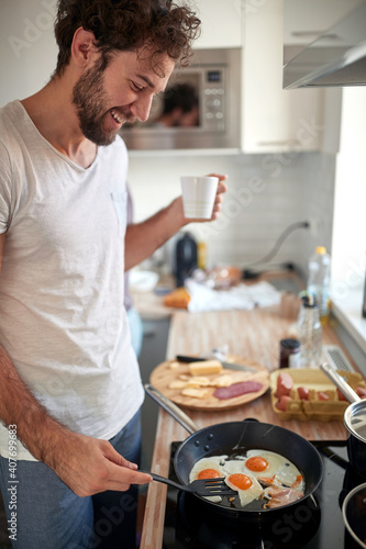 Boyfriend making breakfast for his girlfriend