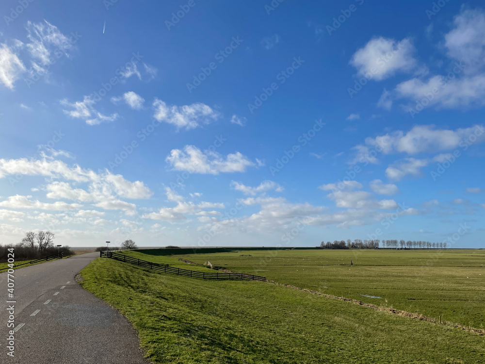 Road on a dyke around Laaksum in Friesland
