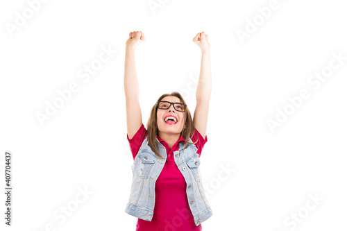 Happy excited woman with arms raised up celebrating success © Feodora