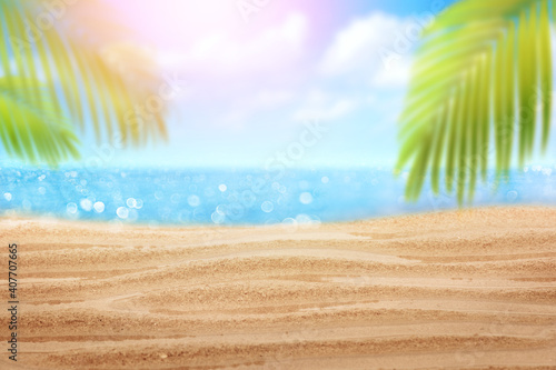 Tropical wet fine sandy beach with blured sea background and empty space for product advertisement  Montage of summer relaxation background photo