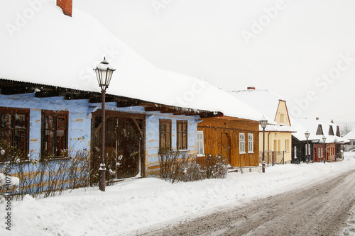 picturesque historical architecture of Lanckorona village in southern Poland during snowstorm photo