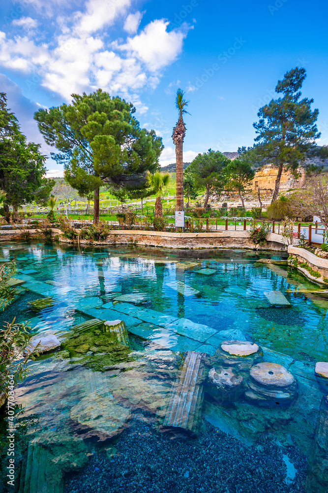 The Antique pool (Cleopatra's Bath) view in Pamukkale. It's a popular touristic destination during a Pamukkale visit