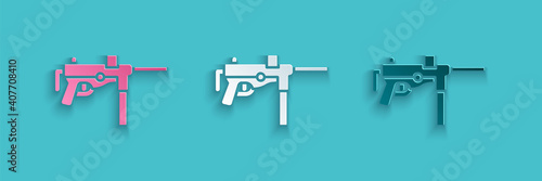 Paper cut Submachine gun M3, Grease gun icon isolated on blue background. Paper art style. Vector.