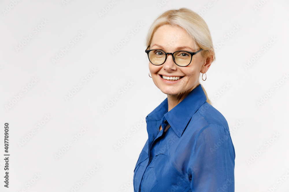 Side view of blonde successful confident employee business woman 40s in ...