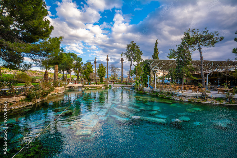 The Antique pool (Cleopatra's Bath) view in Pamukkale. It's a popular touristic destination during a Pamukkale visit
