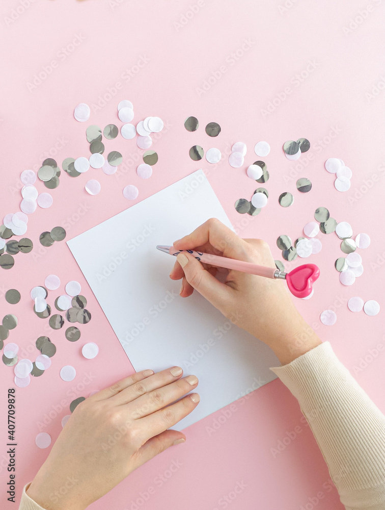 Female’s hand writes card letters holiday love Valentine’s Day Female’s hand writes card letters holiday love Valentine’s Day