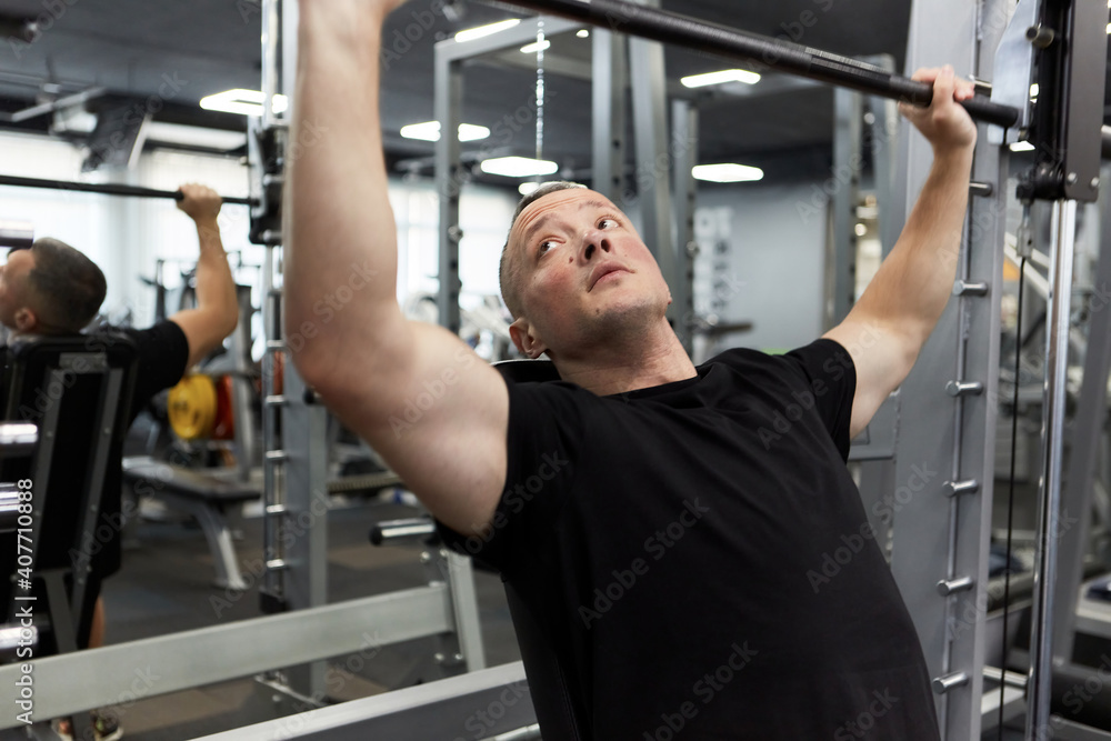 Man in the training gym working hard after quarantine. Man in the training gym working hard after quarantine.