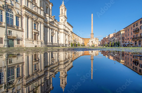 Rome, Italy - in Winter time, frequent rain showers create pools in which the wonderful Old Town of Rome reflect like in a mirror. Here in particular Piazza Navona © SirioCarnevalino