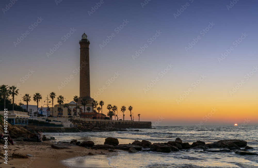 horizontal view of the Chipiona lighthouse in Andalusia at sunse horizontal view of the Chipiona lighthouse in Andalusia at sunse