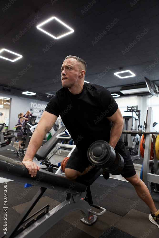 Man in the training gym working hard after quarantine. Man in the training gym working hard after quarantine.