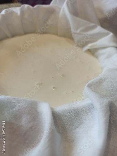 Homemade cream cheese by hands, tutorial making cheese