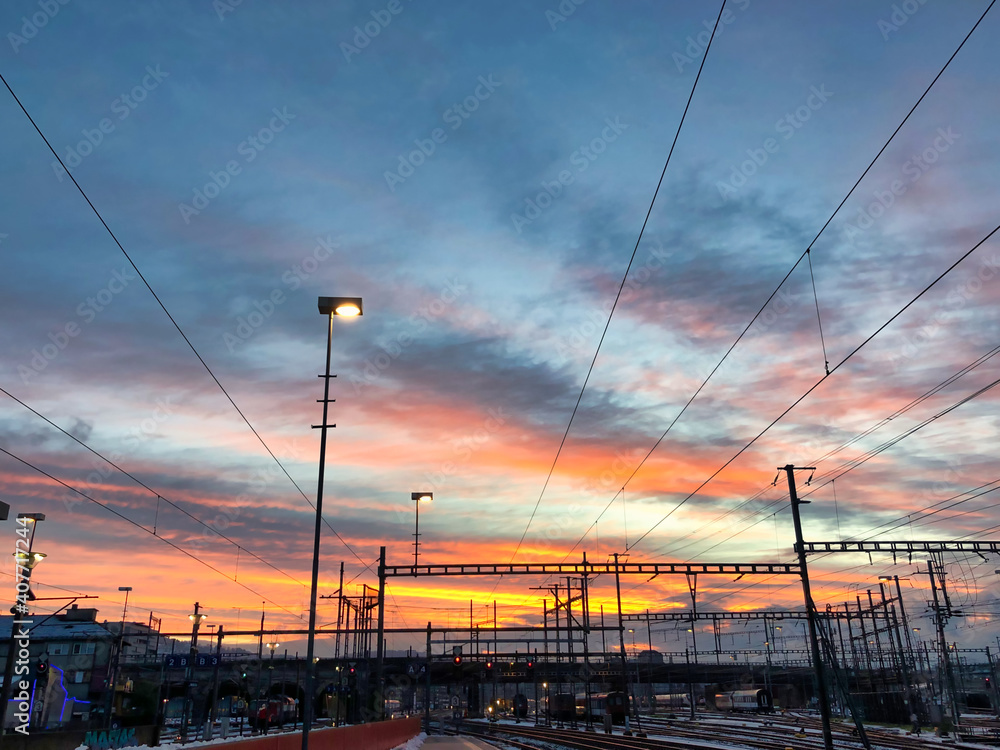 Colorful morning sky over the tracks at Hardbrücke station in January 2021, Zurich, Switzerland