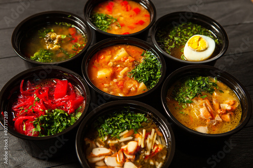 Business lunch in eco plastic container ready for delivery.Top view. Office Lunch boxes with food ready to go. Food takes away. Catering, brakfast