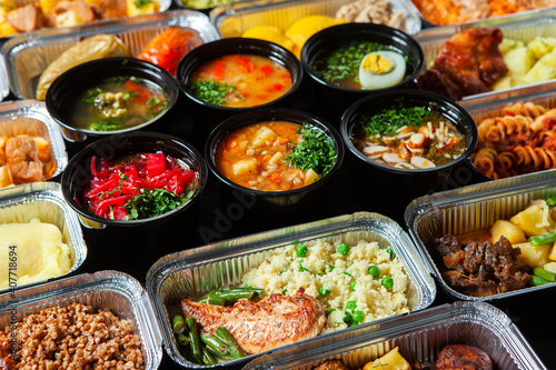 Business lunch in eco plastic container ready for delivery.Top view. Office Lunch boxes with food ready to go. Food takes away. Catering  brakfast