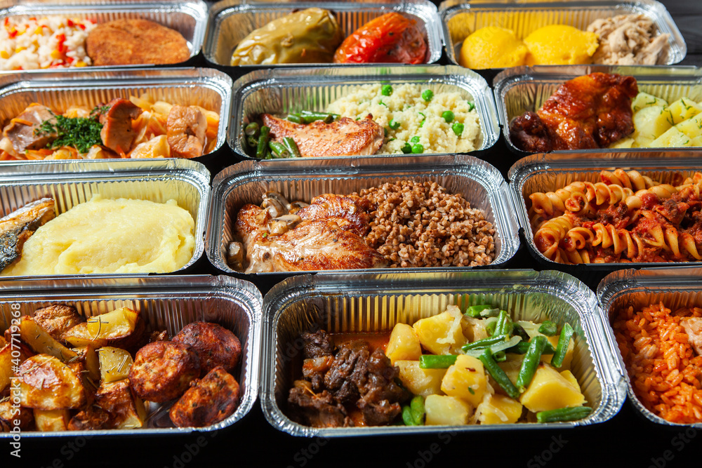 Business lunch in eco plastic container ready for delivery.Top view. Office Lunch boxes with food ready to go. Food takes away. Catering, brakfast