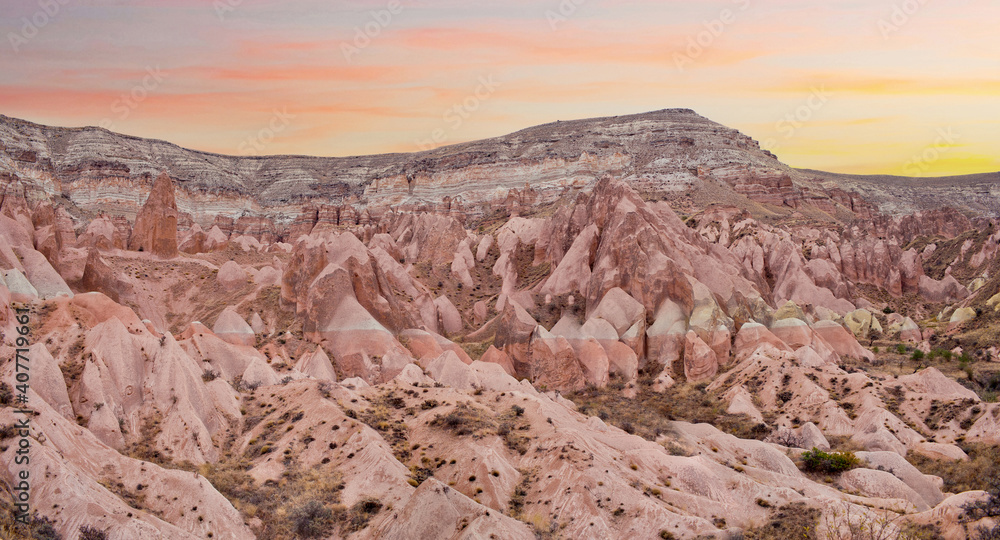 Fototapeta premium Sunset view from Aktepe Hill over Red valley in Cappadocia, Anatolia, Turkey. Goreme National Park..
