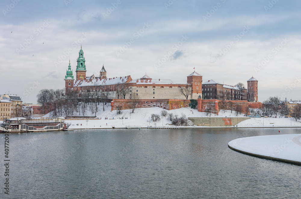 Krakow winter, Wawel Castle over Vistula river, snow, Poland