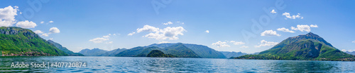 Panoramic landscape view of Bellagion village from Lake Como on the Italian riviera in Lombardy region, Italy. Scenic view on the horizon © PhotoFires