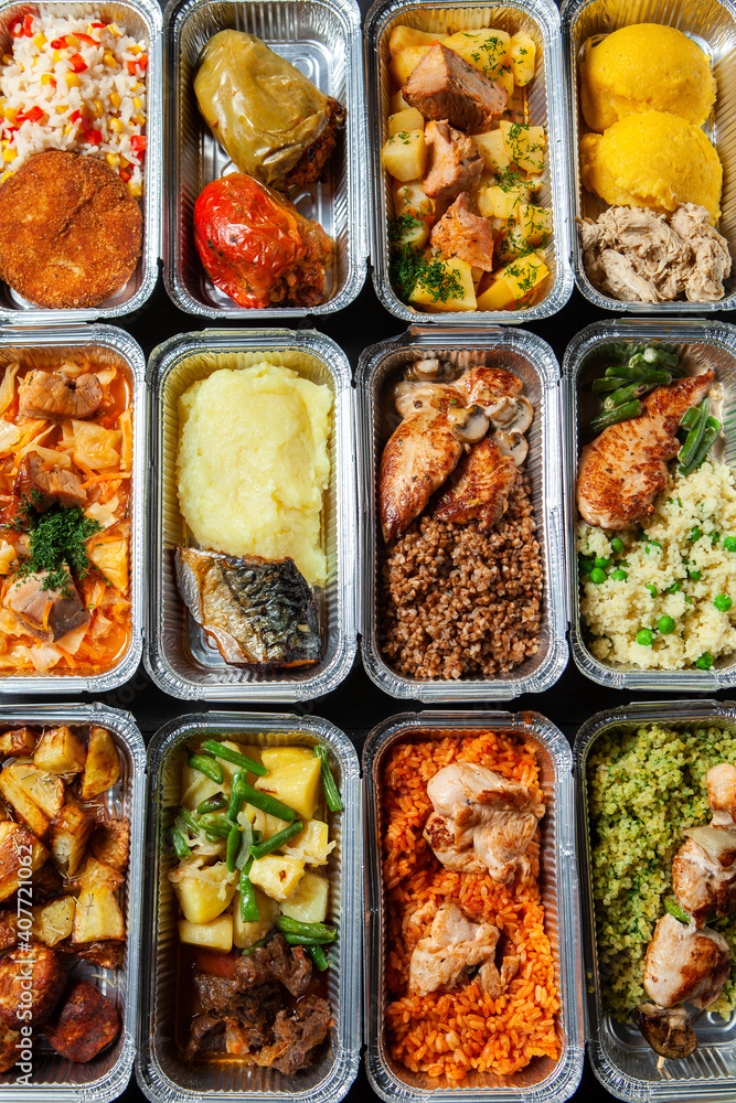 Business lunch in eco plastic container ready for delivery.Top view. Office Lunch boxes with food ready to go. Food takes away. Catering, brakfast.