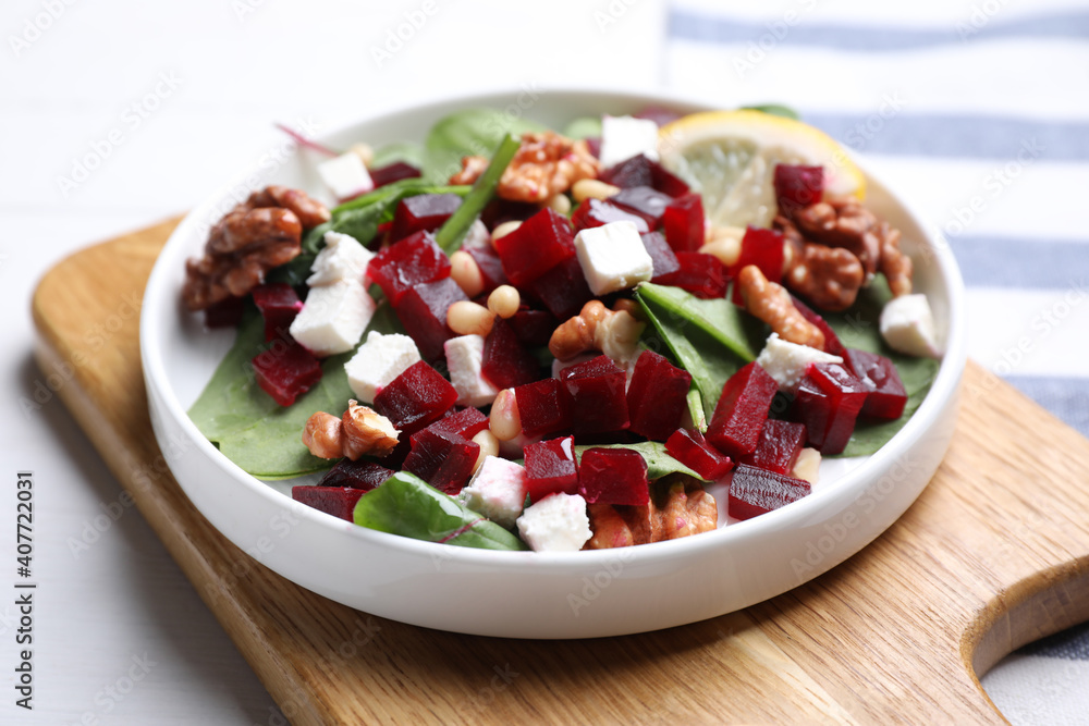 Delicious beet salad served on white table, closeup Delicious beet salad served on white table, closeup