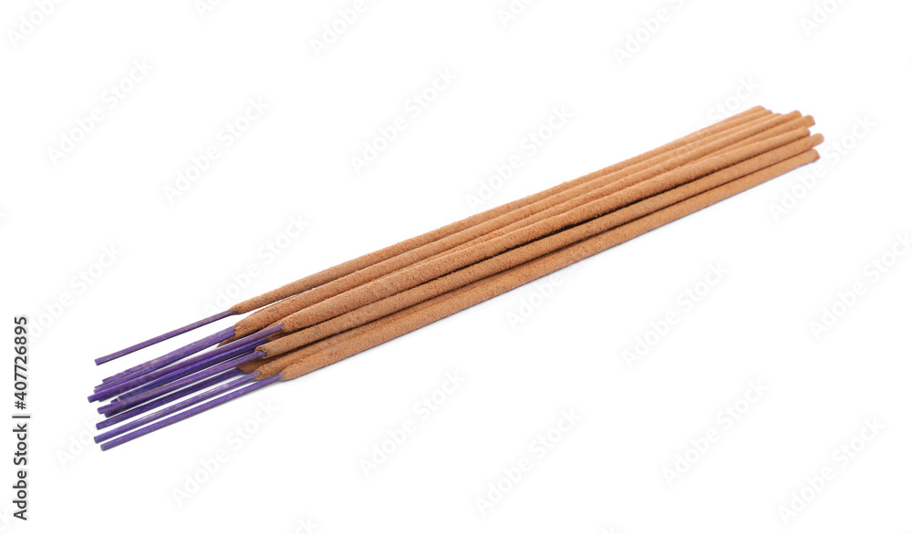 Many aromatic incense sticks on white background